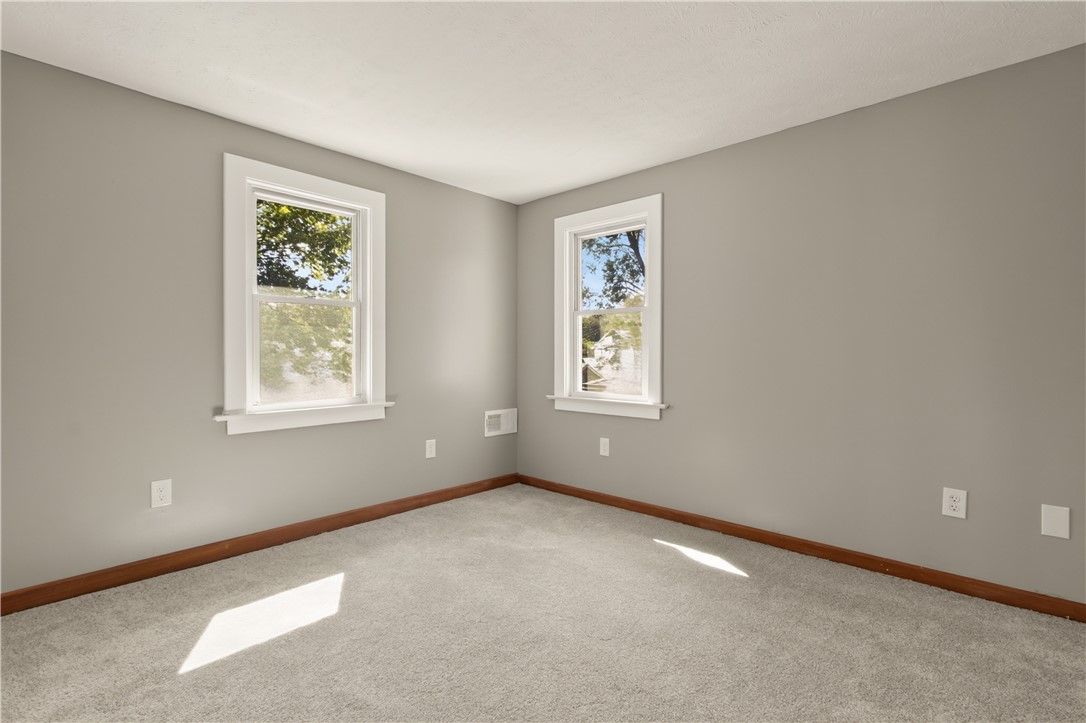 67 Harwick Road Irondequoit, NY 14609 - Photo 21 of 33 Bedroom #3 featuring brand new carpet & vinyl windows