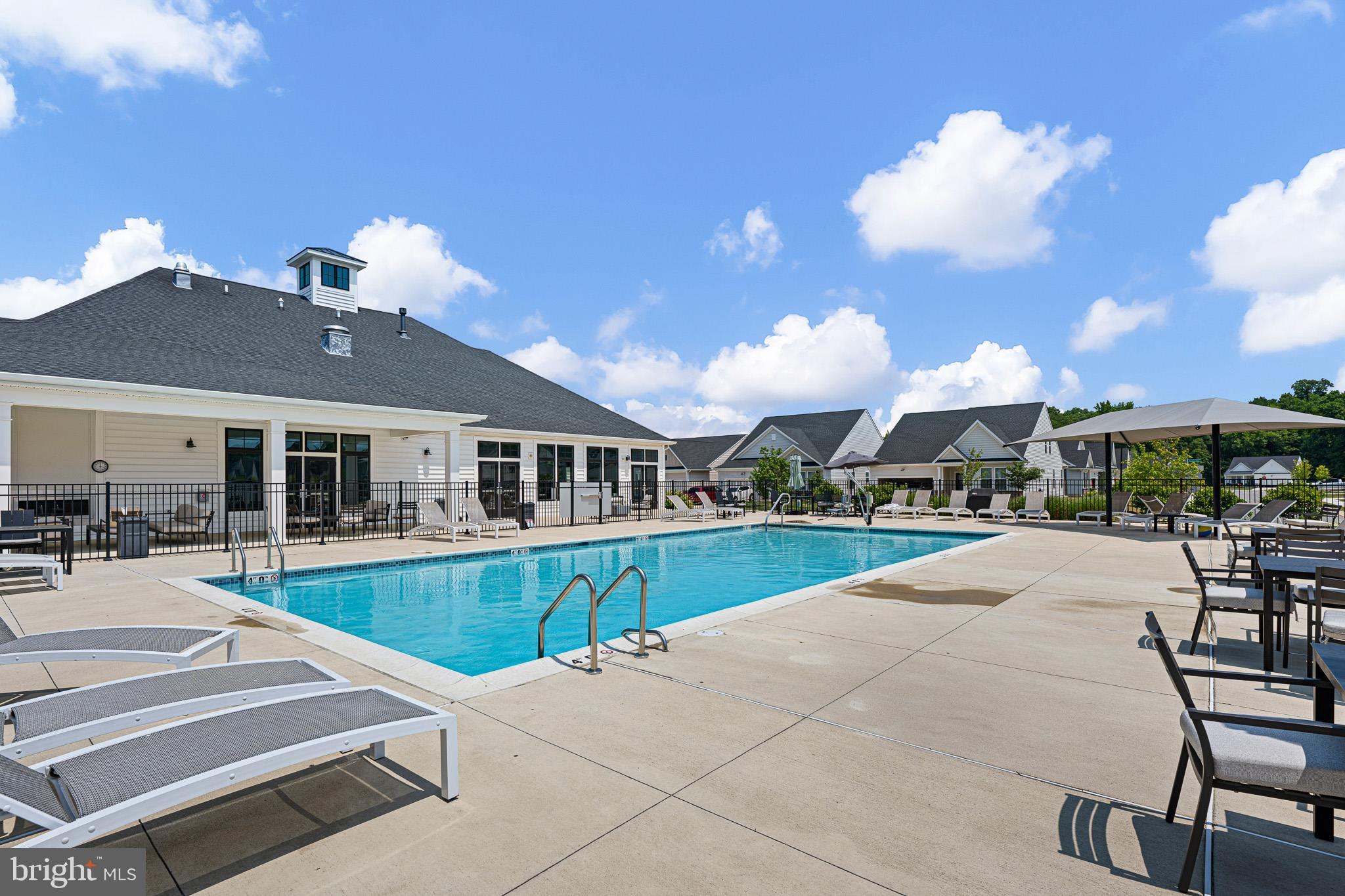 106 Berks Road Smyrna, DE 19977 - Photo 43 of 48 Club house pool with seating