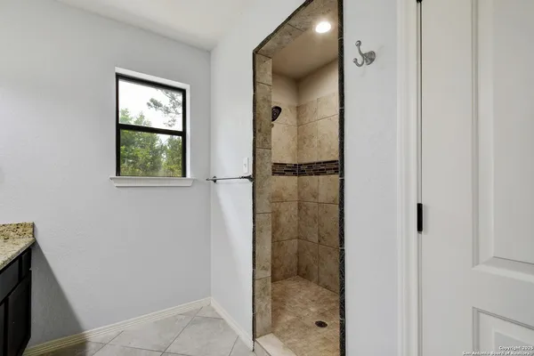 a close view of a shower in bathroom