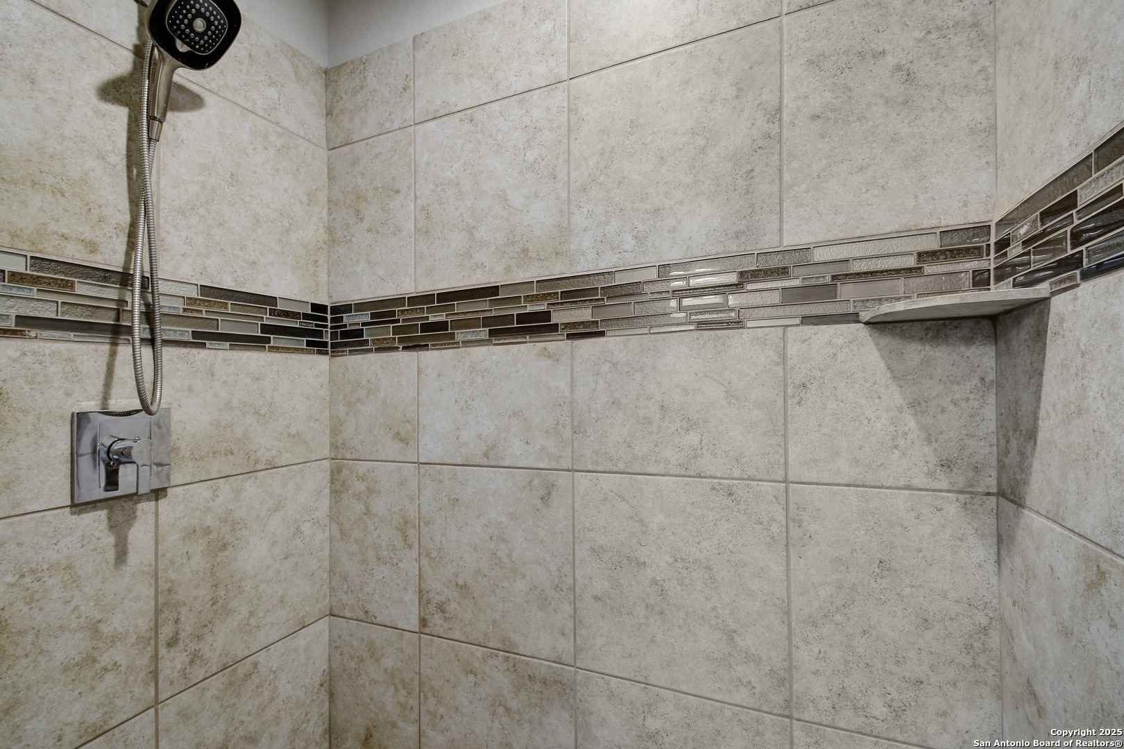 1010 Persimmon Pass Fischer, TX 78623 - Photo 18 of 26 a close view of a shower in bathroom