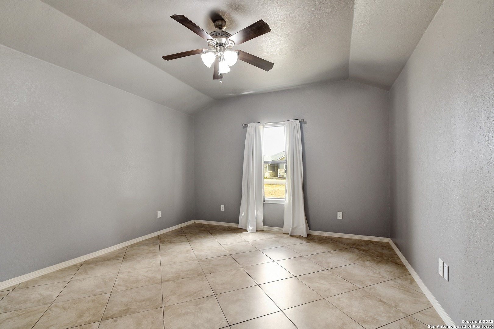 1010 Persimmon Pass Fischer, TX 78623 - Photo 19 of 26 an empty room with fan and a ceiling fan