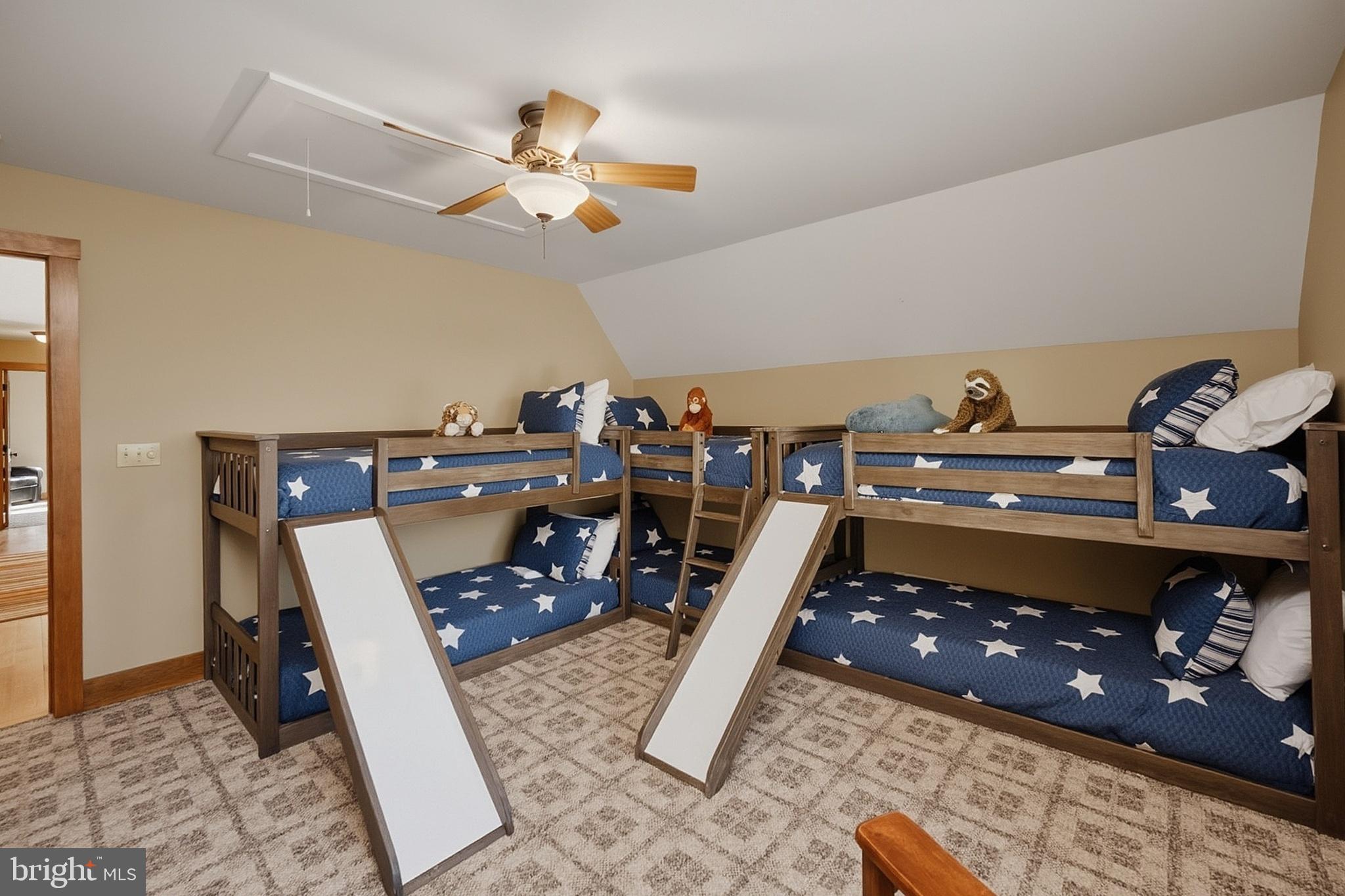 185 Ruta Lane Swanton, MD 21561 - Photo 63 of 81 a bed room with a bed and a fireplace