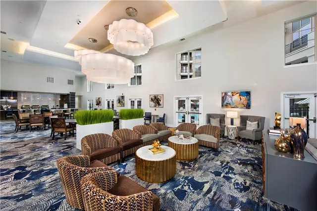 a living room with lots of furniture and decor