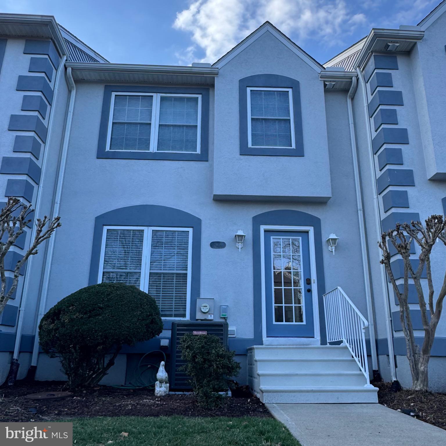 280 American Eagle Way, Unit 2806 Rehoboth Beach, DE 19971 - Photo 10 of 41 a front view of a house with garden