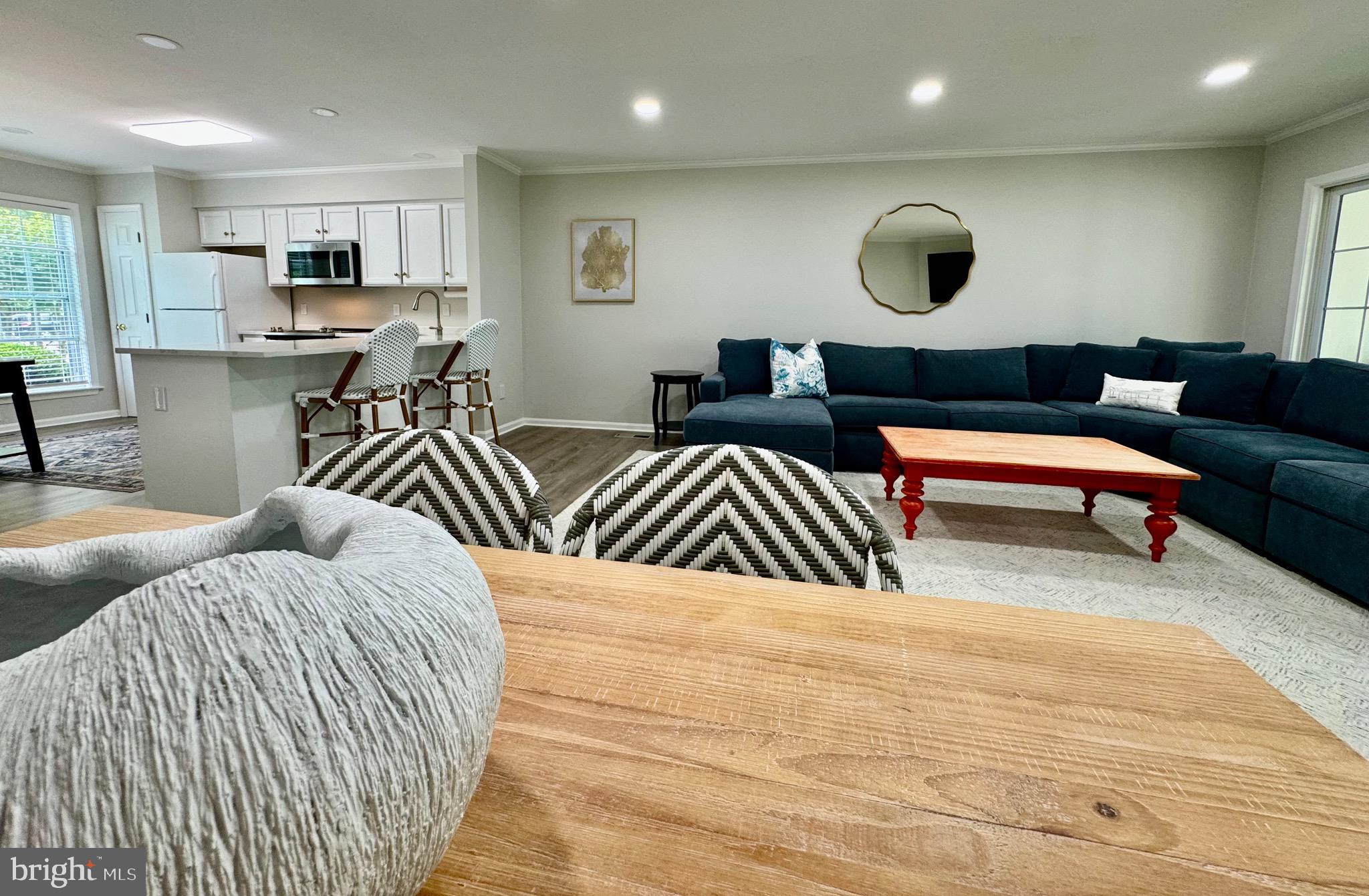 280 American Eagle Way, Unit 2806 Rehoboth Beach, DE 19971 - Photo 11 of 41 a bedroom with two beds and painting on the wall