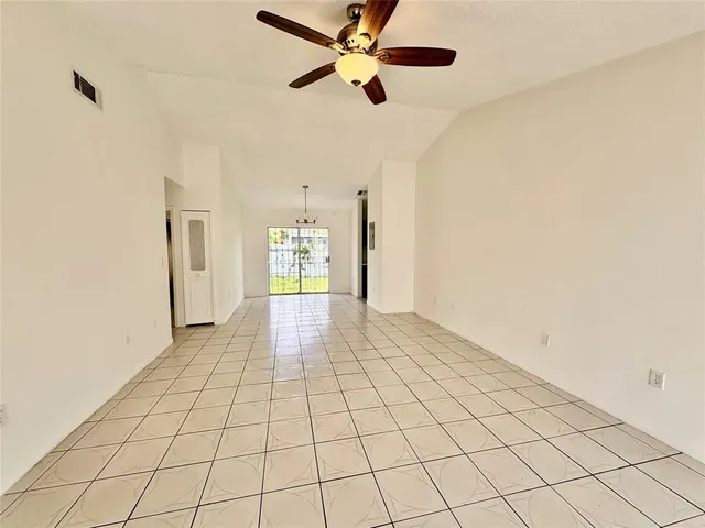 a view of an empty room and window