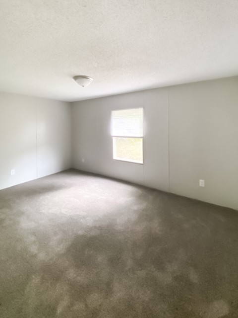 273 Running Meadows Road Portland, TN 37148 - Photo 15 of 20 an empty room with a window