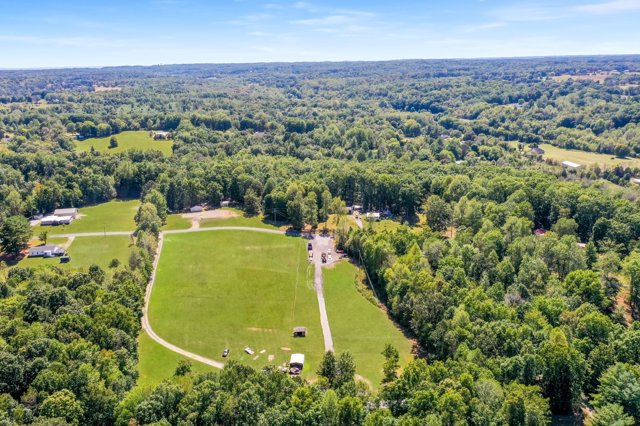 273 Running Meadows Road Portland, TN 37148 - Photo 3 of 20 an aerial view of a house with a swimming pool