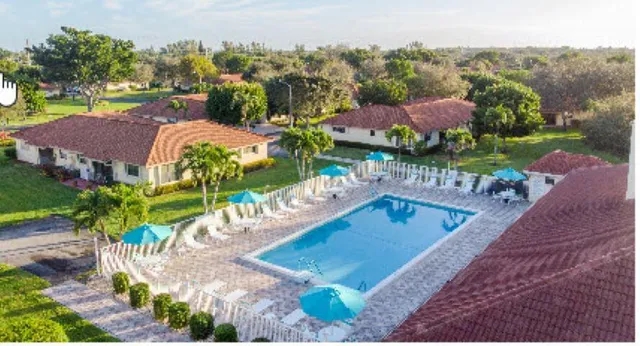 a view of a chairs and table on the terrace