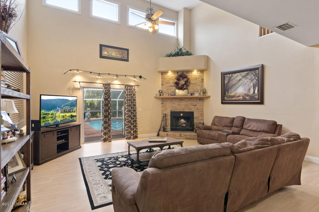 4575 Acorn Way Edgewater, FL 32141 - Photo 2 of 28 Family Room 1B-3