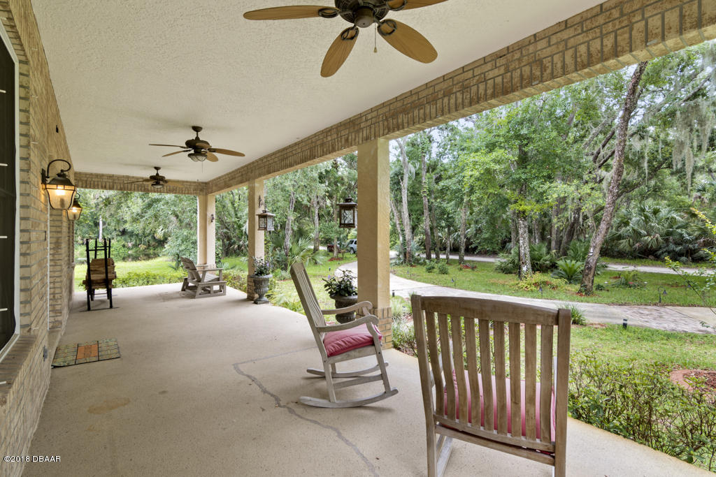 4575 Acorn Way Edgewater, FL 32141 - Photo 25 of 28 Porch Front 1A-3