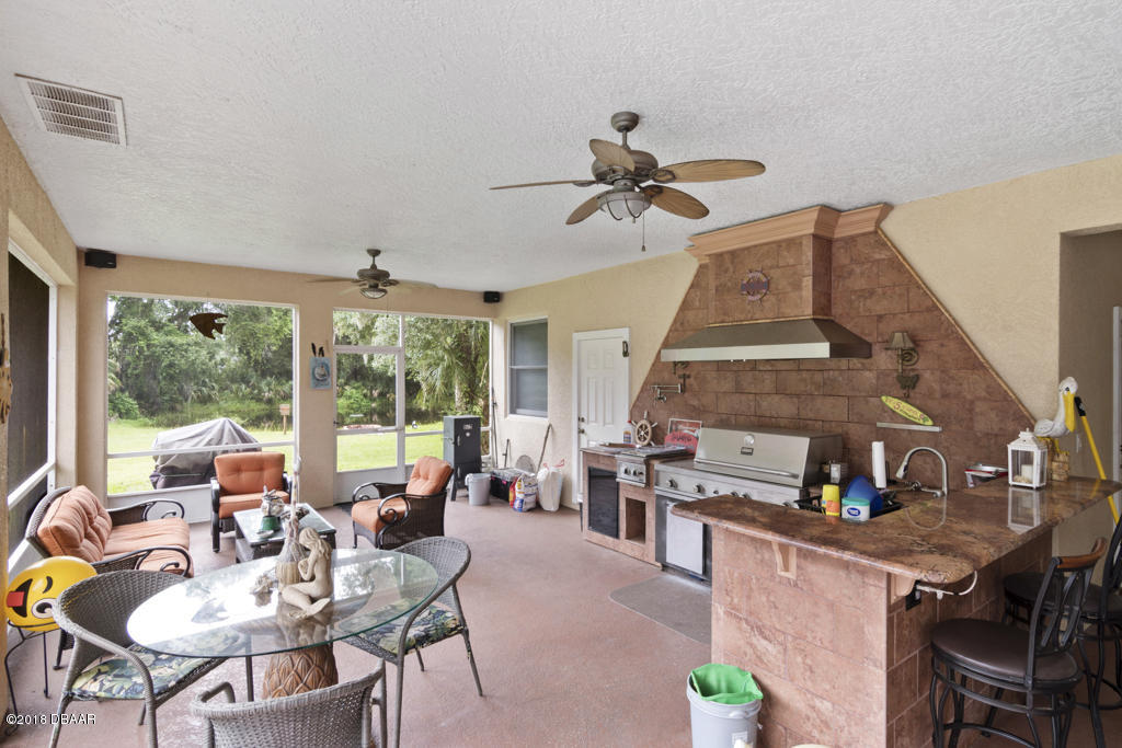 4575 Acorn Way Edgewater, FL 32141 - Photo 8 of 28 Patio-3