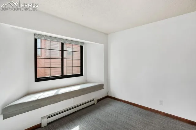 a view of staircase with white walls