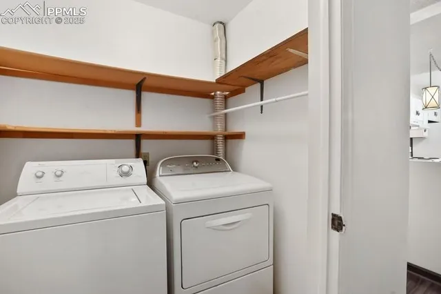 a utility room with dryer and washer