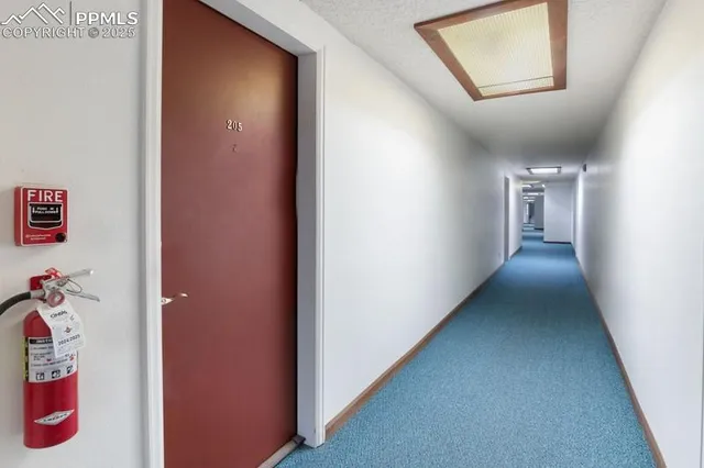 a view of a hallway with elevator