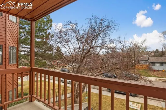 a view of a street from a balcony