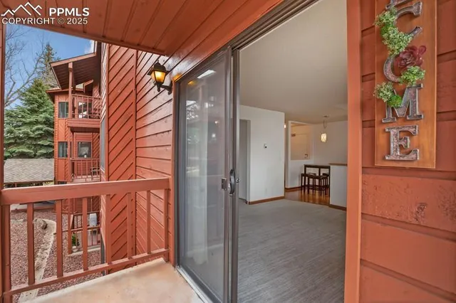 an outdoor view of a house with outdoor seating