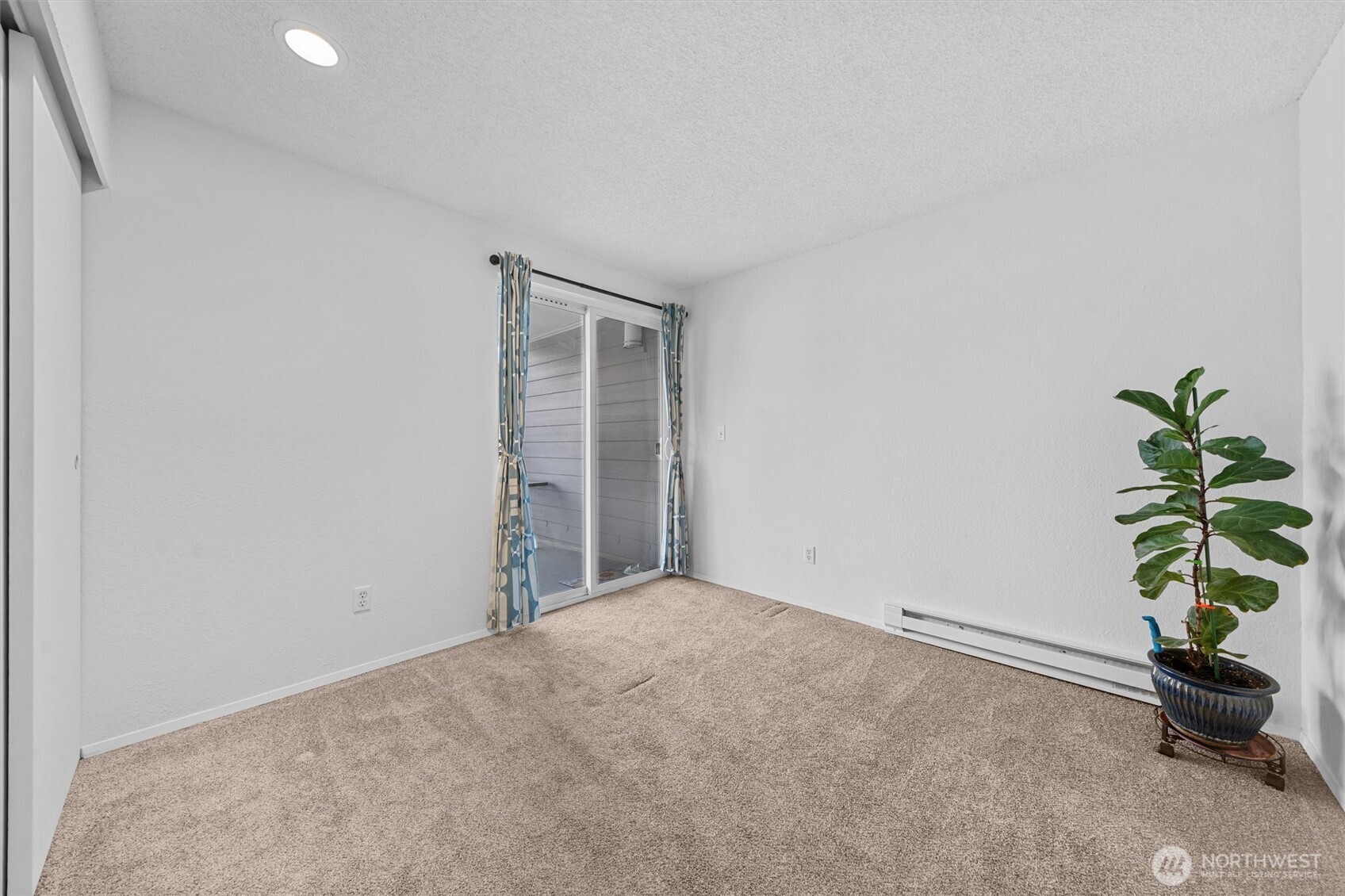 2515 Northeast 4th Street, Unit 522 Renton, WA 98056 - Photo 18 of 33 a view of a room with a potted plant