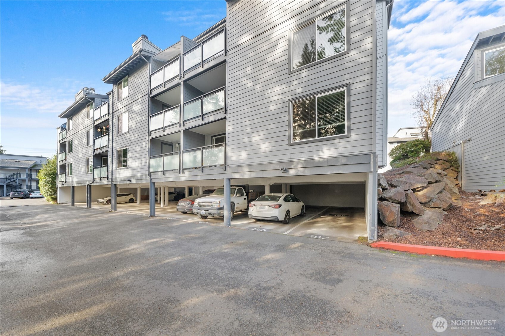 2515 Northeast 4th Street, Unit 522 Renton, WA 98056 - Photo 24 of 33 a view of a building with many windows