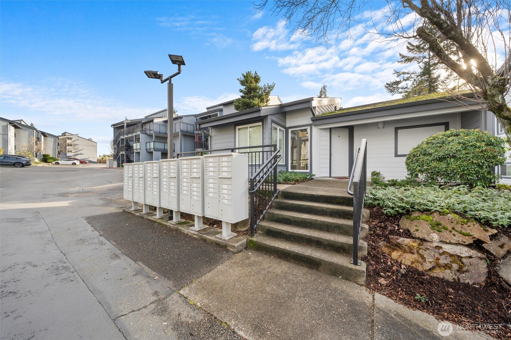 2515 Northeast 4th Street, Unit 522 Renton, WA 98056 - Photo 28 of 33 a view of a house with a yard