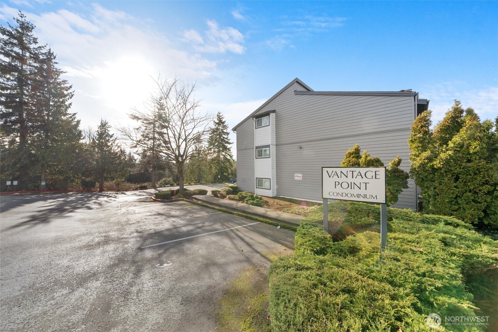 2515 Northeast 4th Street, Unit 522 Renton, WA 98056 - Photo 30 of 33 a sign board on the side of a road