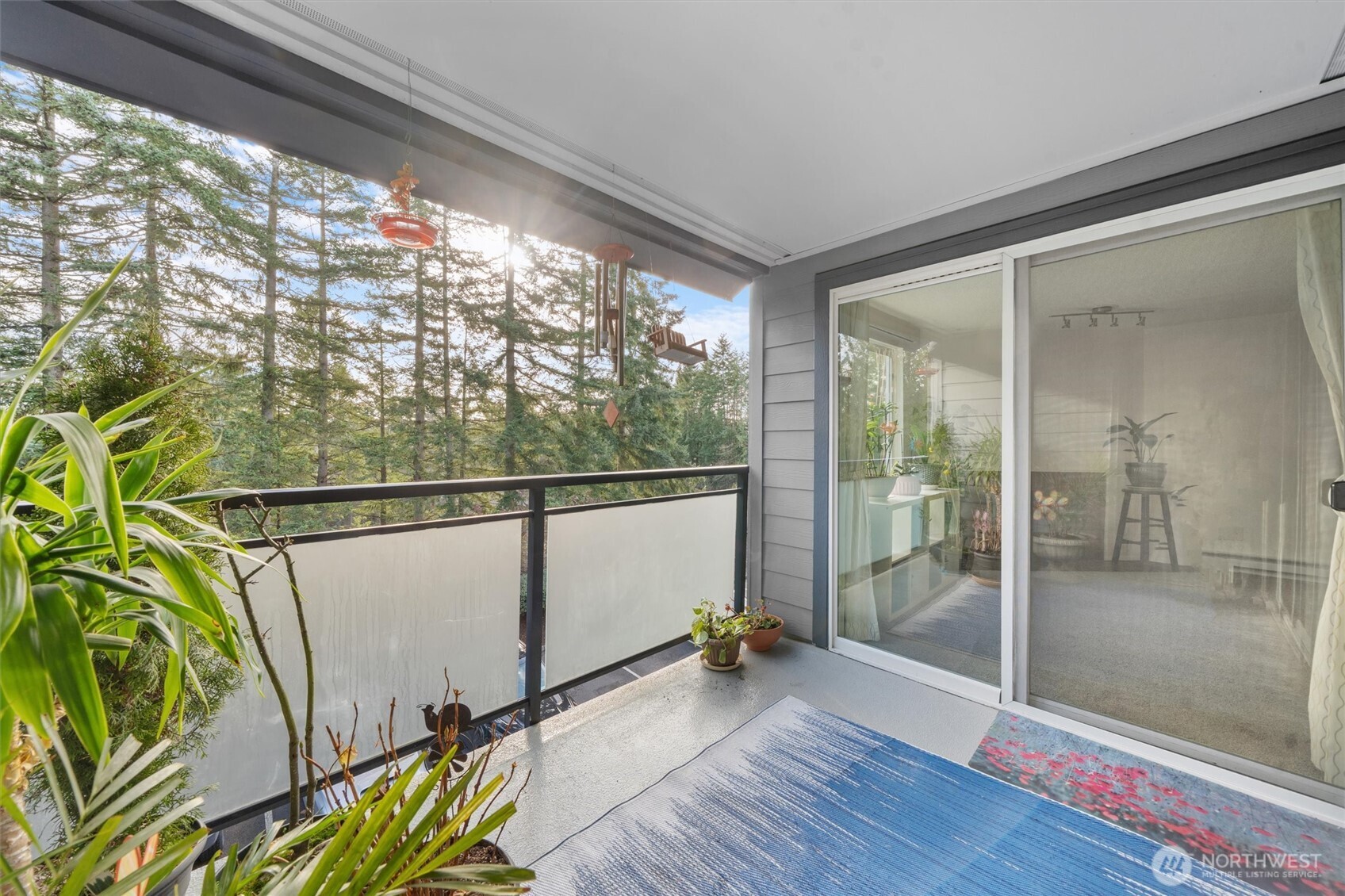 2515 Northeast 4th Street, Unit 522 Renton, WA 98056 - Photo 5 of 33 a view of a room with wooden floor and chair