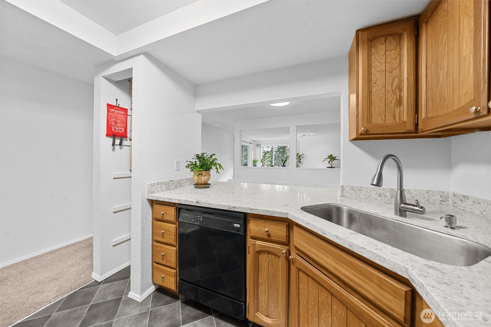2515 Northeast 4th Street, Unit 522 Renton, WA 98056 - Photo 8 of 33 a kitchen with a sink and a cabinets
