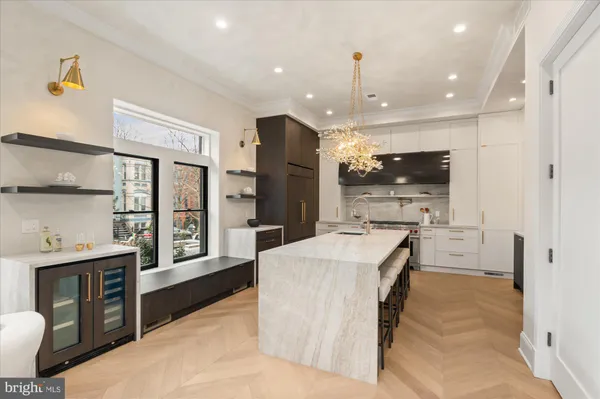 a kitchen with a stove and a microwave