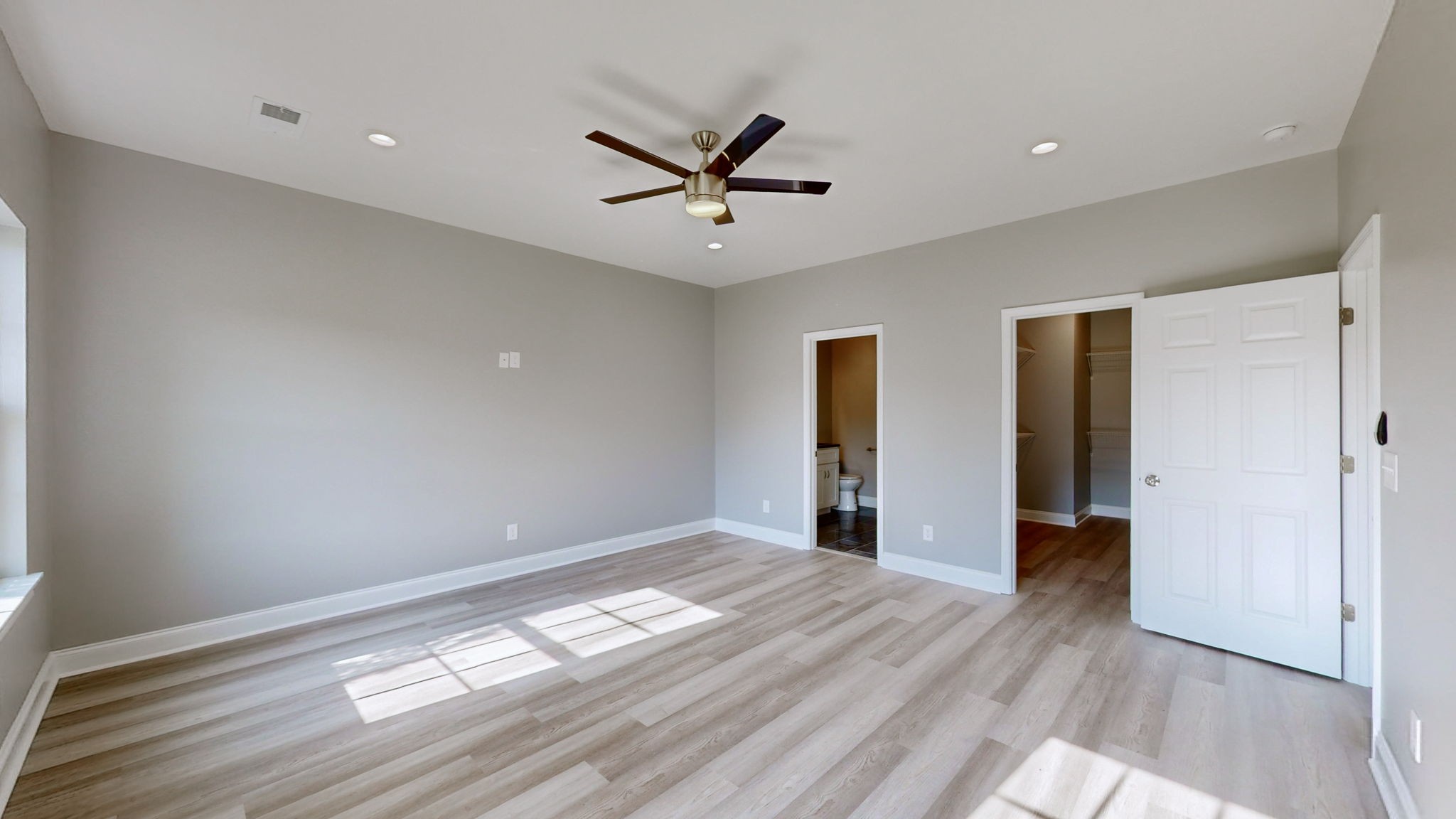 1093 Bob Meadows Road Manchester, TN 37355 - Photo 21 of 43 a view of empty room with wooden floor and fan