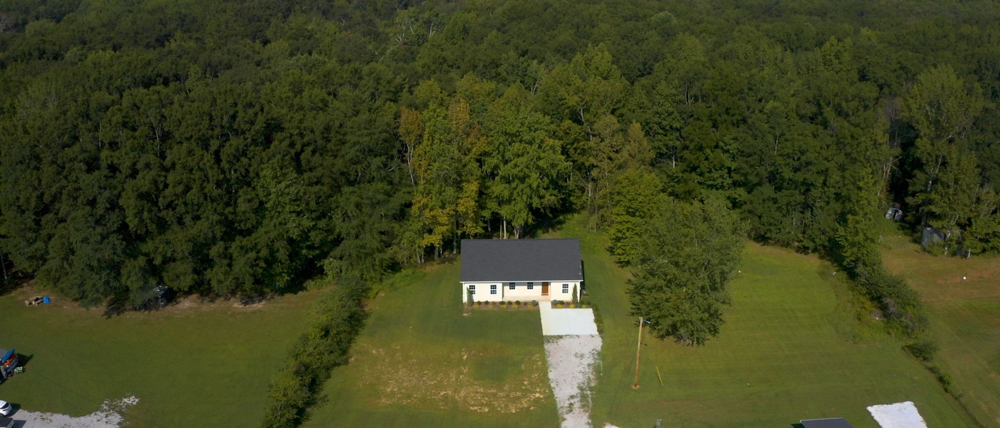 1093 Bob Meadows Road Manchester, TN 37355 - Photo 38 of 43 a view of a lake with a yard