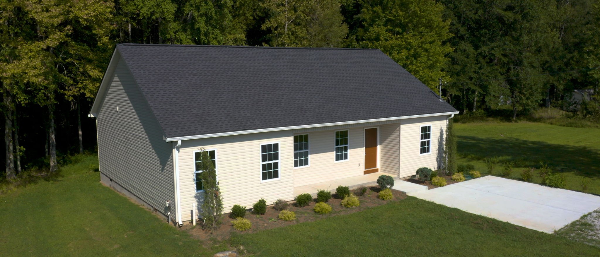 1093 Bob Meadows Road Manchester, TN 37355 - Photo 39 of 43 front view of a house with a yard