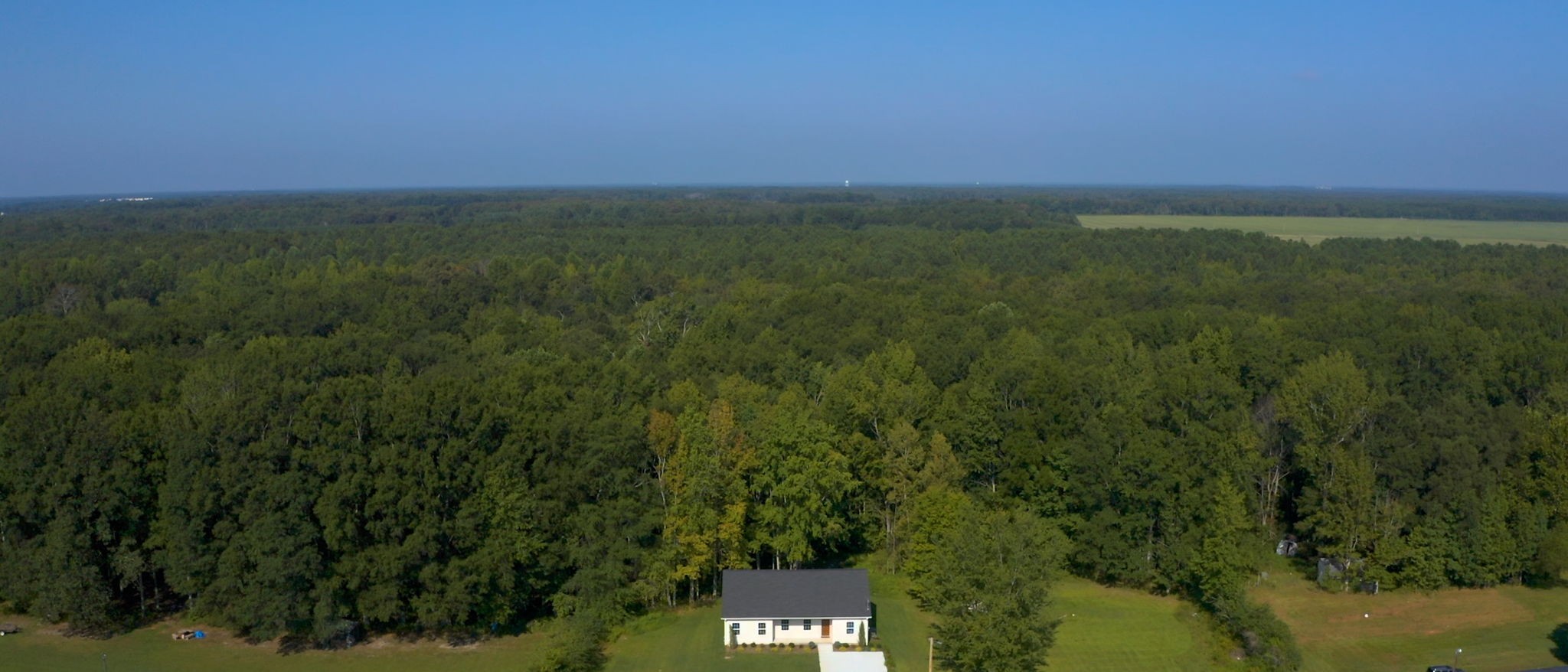 1093 Bob Meadows Road Manchester, TN 37355 - Photo 43 of 43 a view of a city with lush green forest