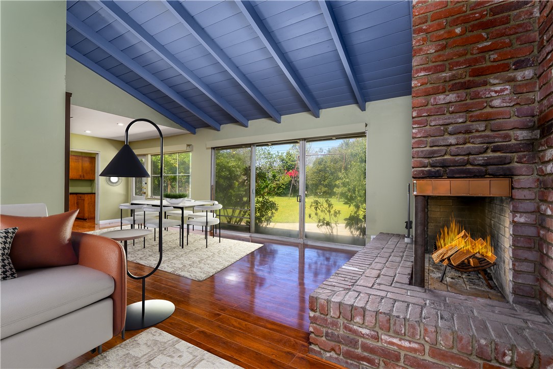 321 West Le Roy Avenue Arcadia, CA 91007 - Photo 11 of 38 a living room with furniture a fireplace and floor to ceiling window