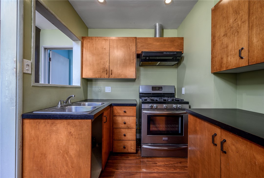 321 West Le Roy Avenue Arcadia, CA 91007 - Photo 16 of 38 a kitchen with stainless steel appliances granite countertop a stove and a sink
