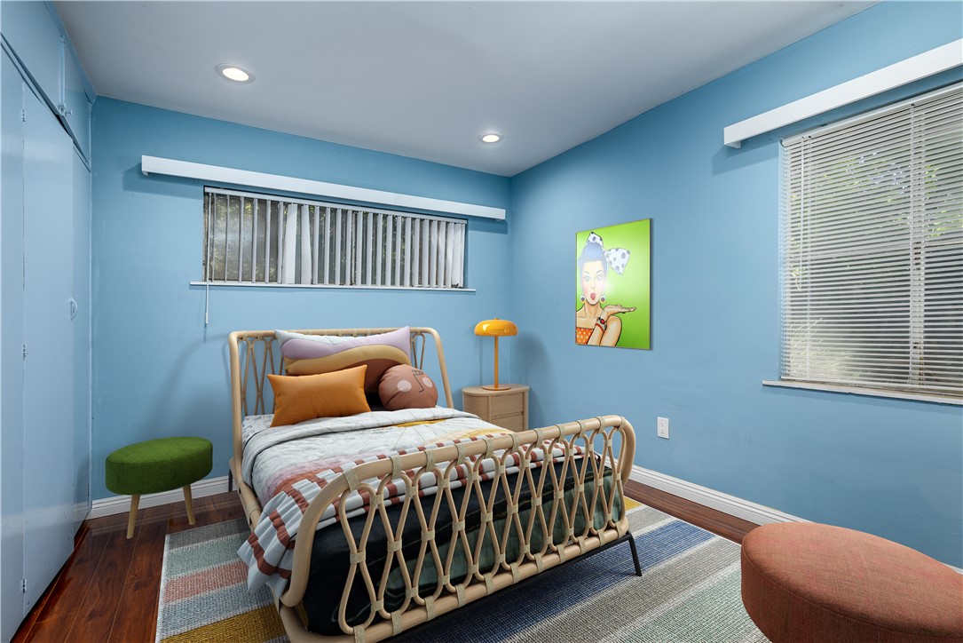 321 West Le Roy Avenue Arcadia, CA 91007 - Photo 18 of 38 a bedroom with a bed and wooden floor