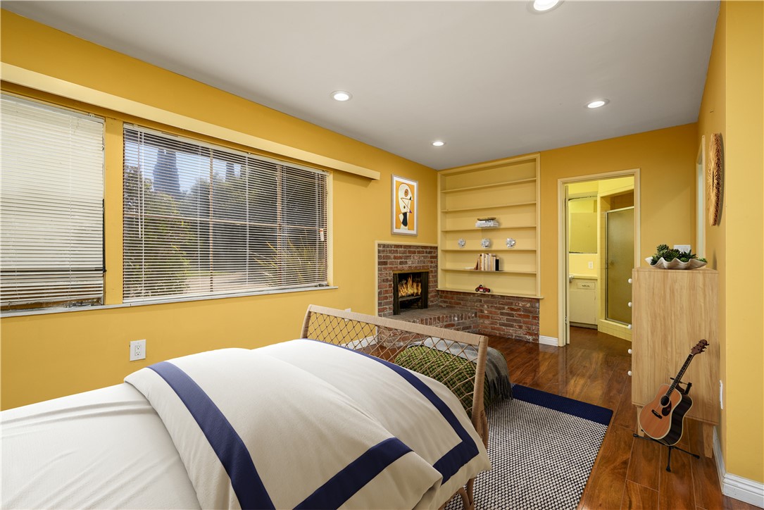 321 West Le Roy Avenue Arcadia, CA 91007 - Photo 22 of 38 a bedroom with a bed and wooden floor