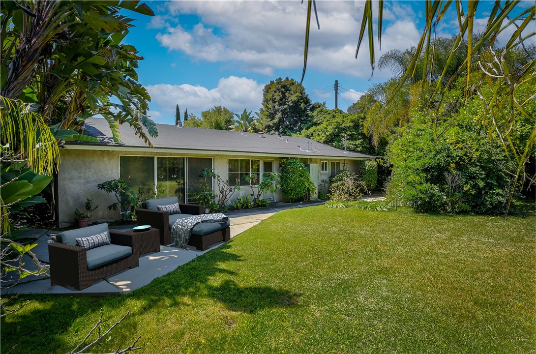 321 West Le Roy Avenue Arcadia, CA 91007 - Photo 26 of 38 a view of a patio with couches plants and large trees
