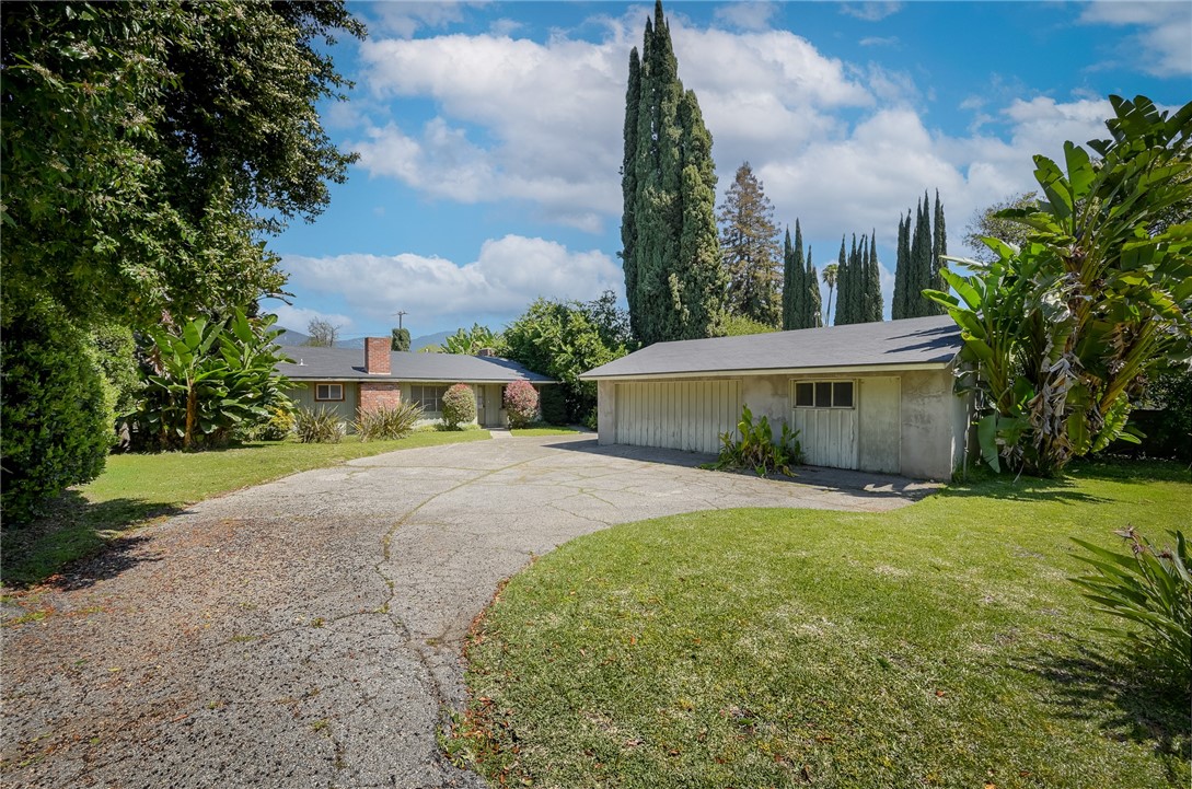 321 West Le Roy Avenue Arcadia, CA 91007 - Photo 5 of 38 a front view of a house with garden