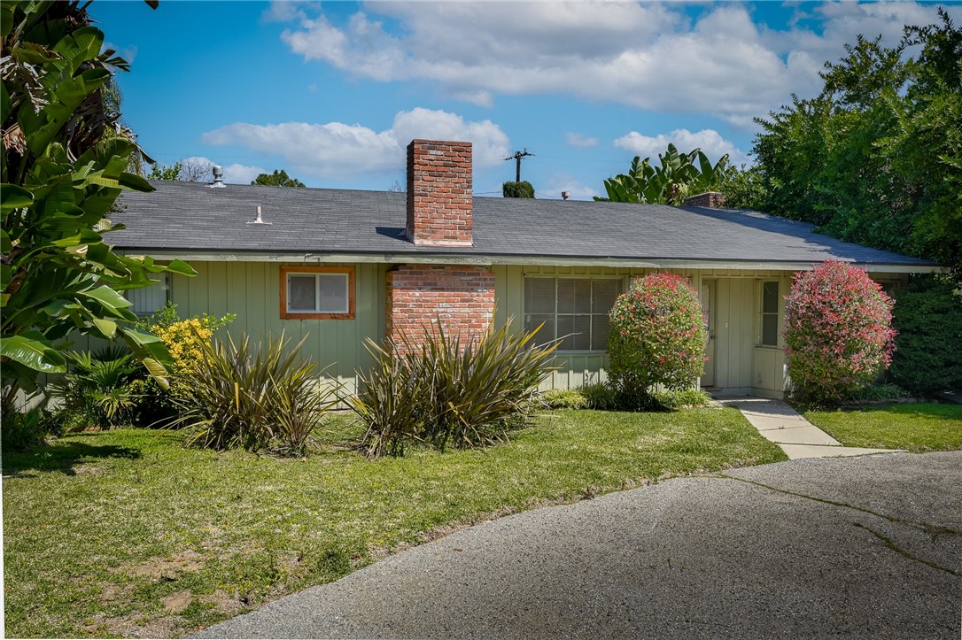 321 West Le Roy Avenue Arcadia, CA 91007 - Photo 7 of 38 a front view of a house with garden