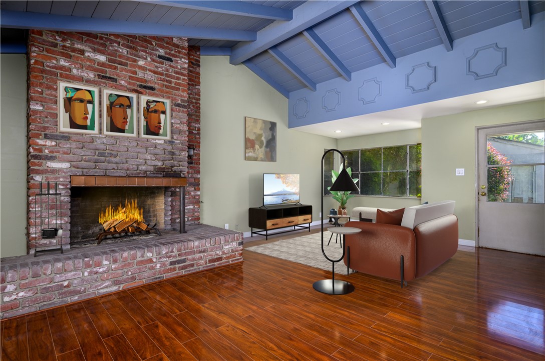 321 West Le Roy Avenue Arcadia, CA 91007 - Photo 10 of 38 a living room with furniture and a fireplace