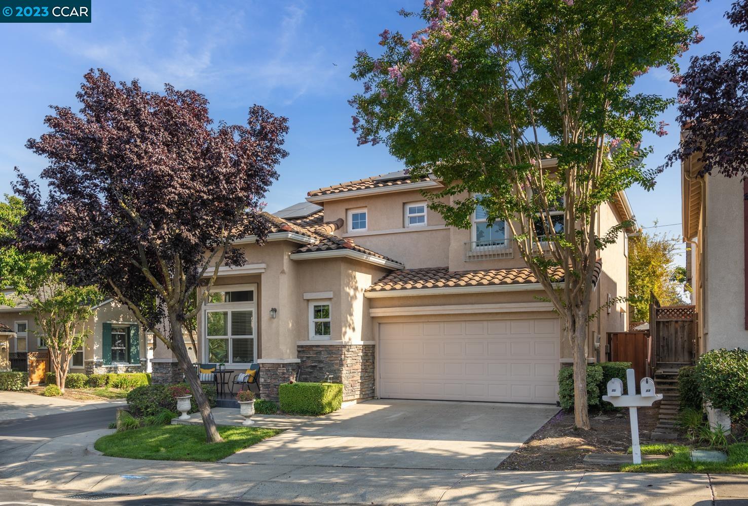15 Poppy Hills Lane San Ramon, CA 94583 - Photo 1 of 1 a view of a white house with a large tree and a yard