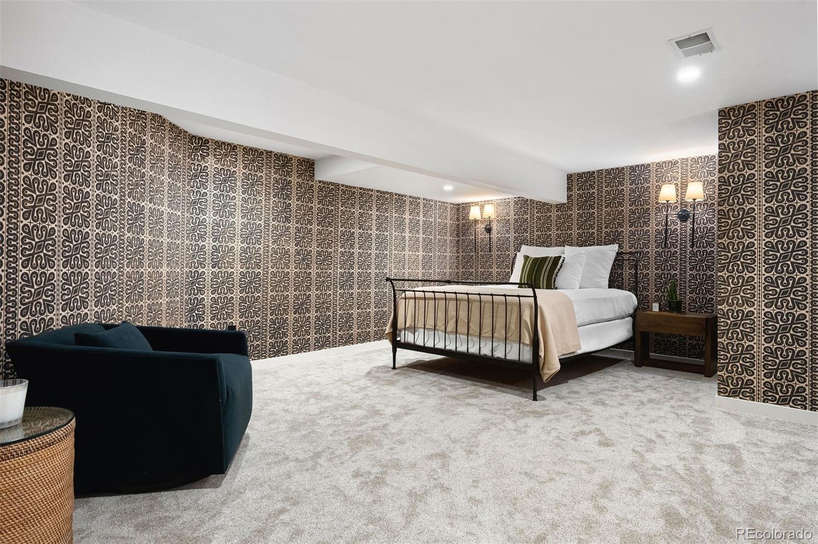 9 Polo Field Lane Denver, CO 80209 - Photo 27 of 36 a bedroom with a bed and a desk