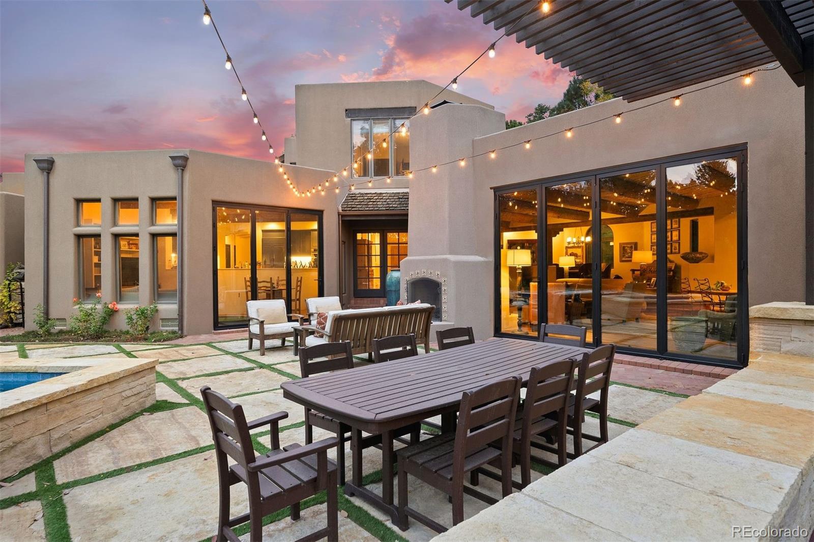 9 Polo Field Lane Denver, CO 80209 - Photo 31 of 36 a outdoor dining space with furniture and wooden floor