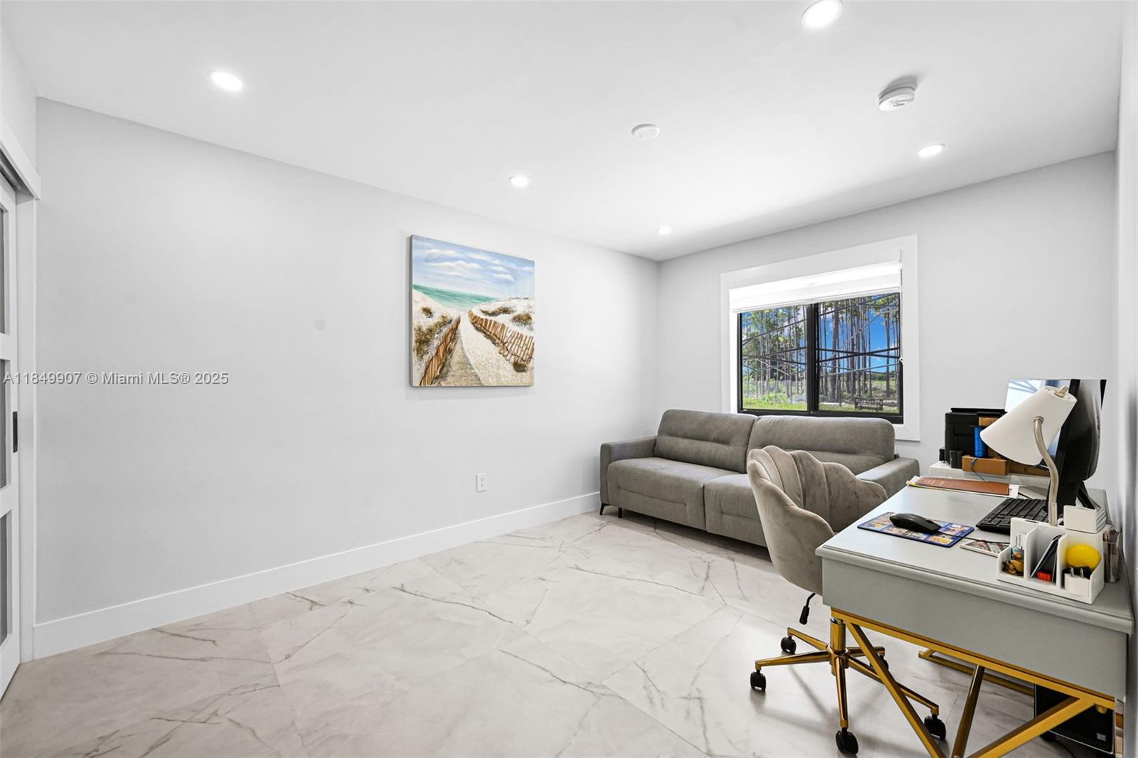 19777 Southwest 334th Street Homestead, FL 33034 - Photo 26 of 55 a living room with furniture and a window
