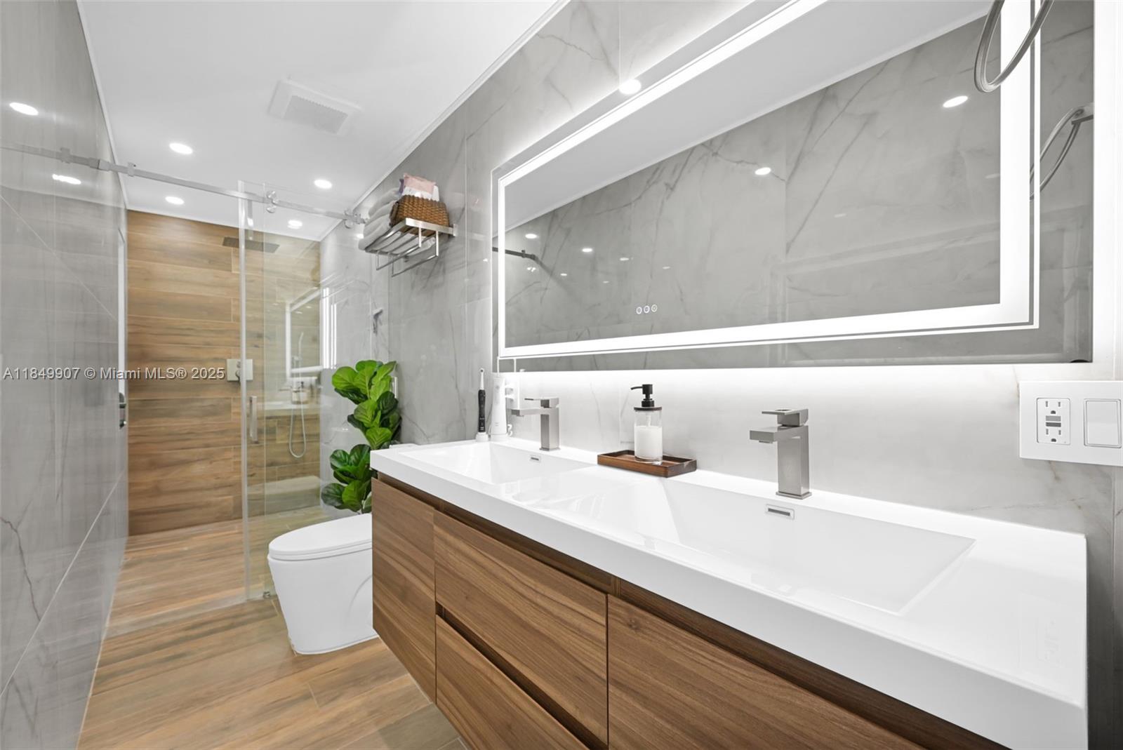 19777 Southwest 334th Street Homestead, FL 33034 - Photo 43 of 55 a bathroom with a sink and a mirror