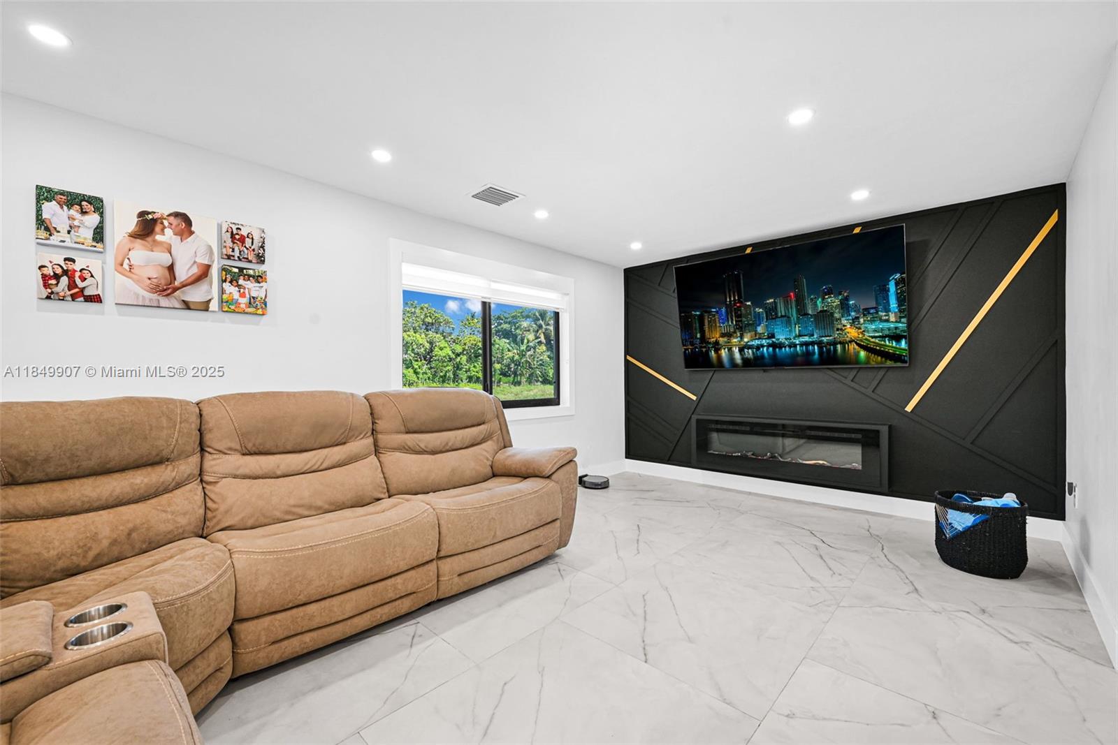 19777 Southwest 334th Street Homestead, FL 33034 - Photo 8 of 55 a living room with furniture and a flat screen tv