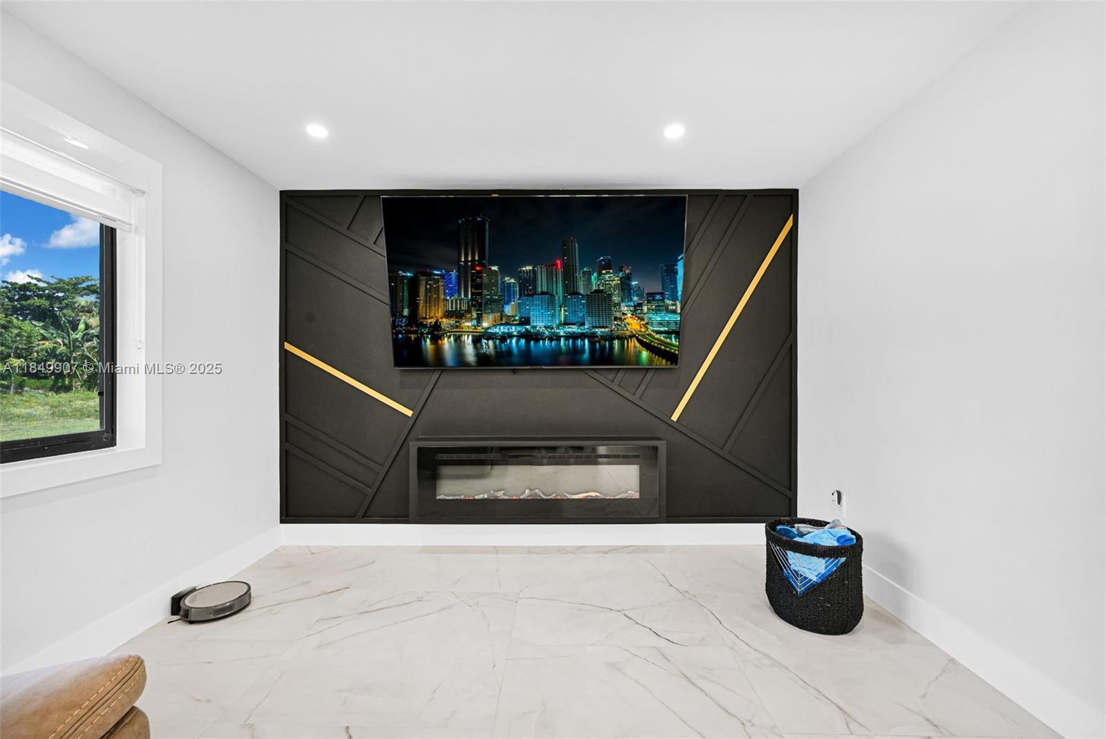 19777 Southwest 334th Street Homestead, FL 33034 - Photo 9 of 55 a living room with furniture and a flat screen tv