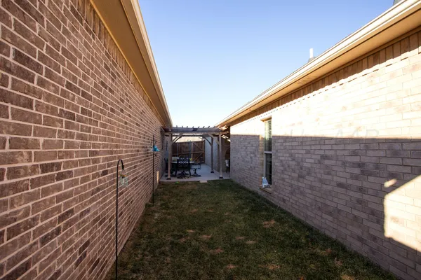 a view of a pathway both side of building
