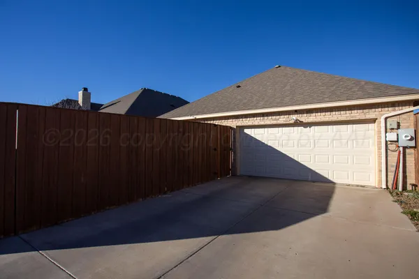 a front view of a house with outdoor seating