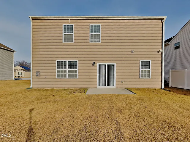 a view of an empty room with basketball court